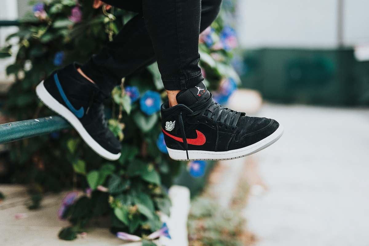 jar black Nike sneakers plant