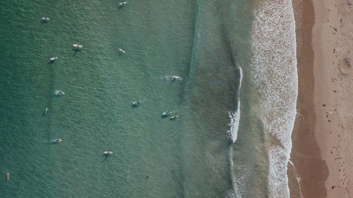 cardigan aerial view of blue body of water clothing