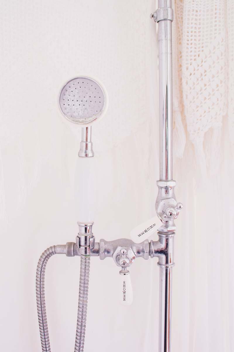 bathroom gray metal handheld shower head paia