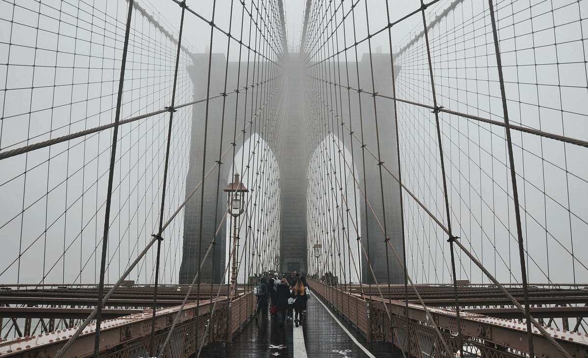 bridge people walking on Brooklyn Bridge building