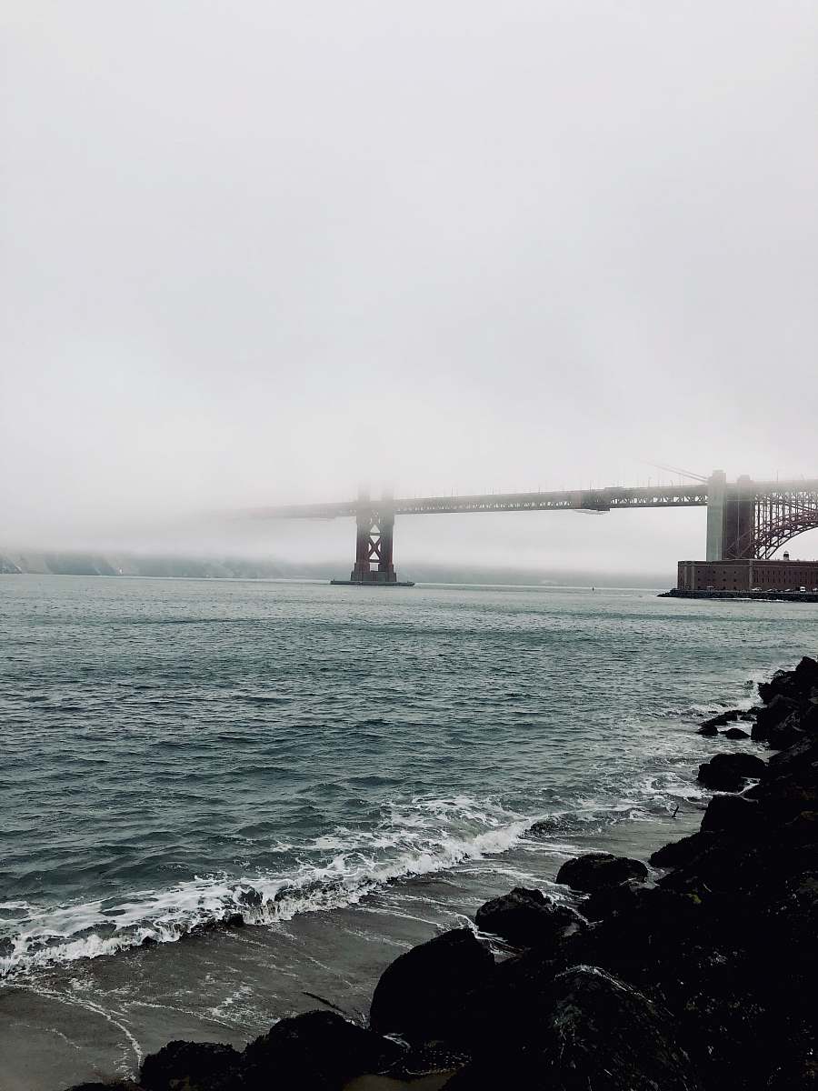 ocean photography of concrete bridge sea