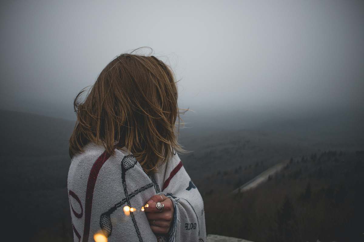 human woman covered with white blanket person