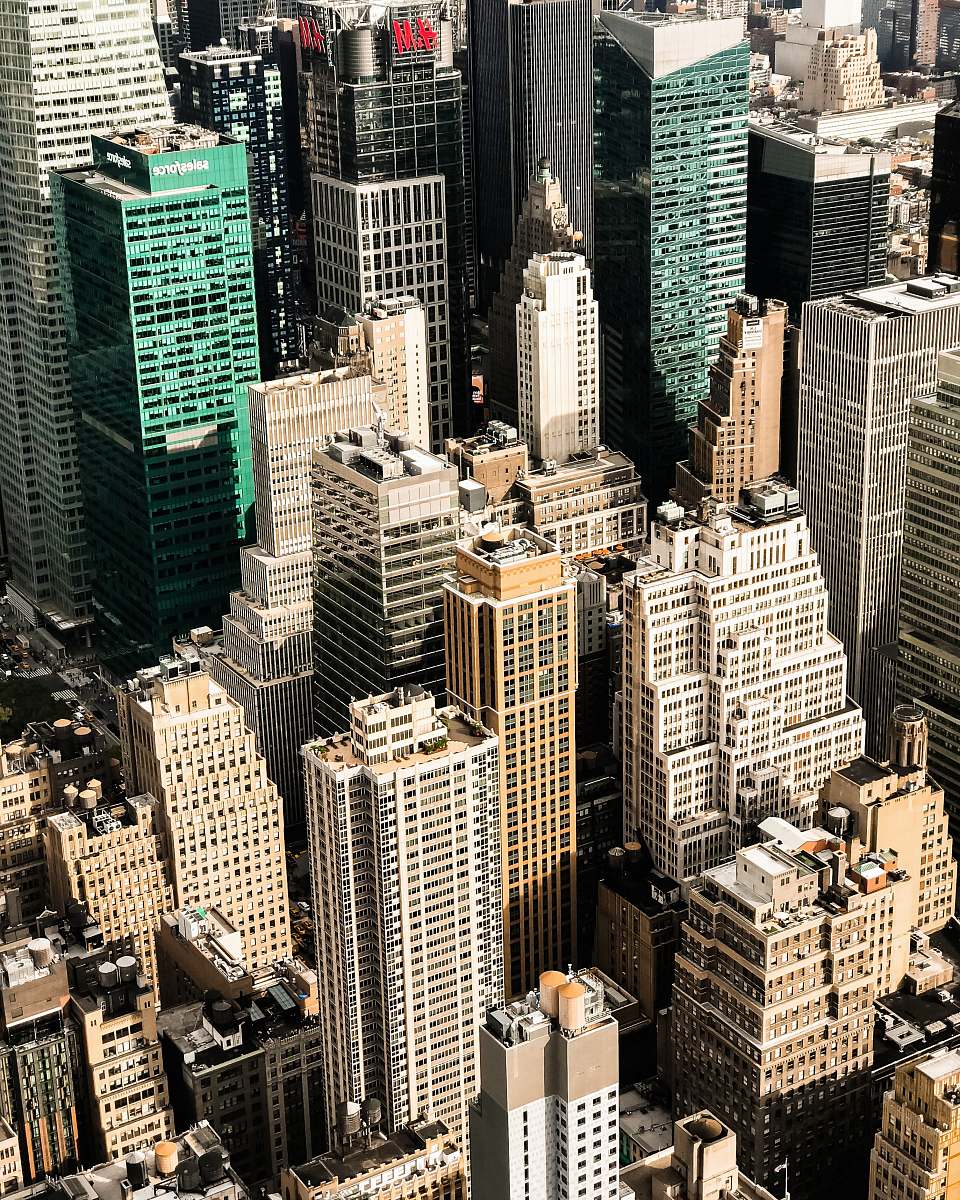 person aerial photography of high-rise buildings people