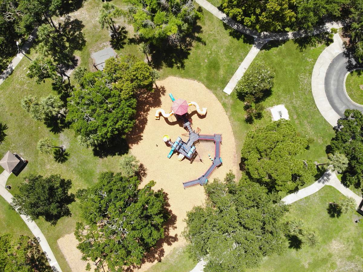 person aerial view of children's playground grass