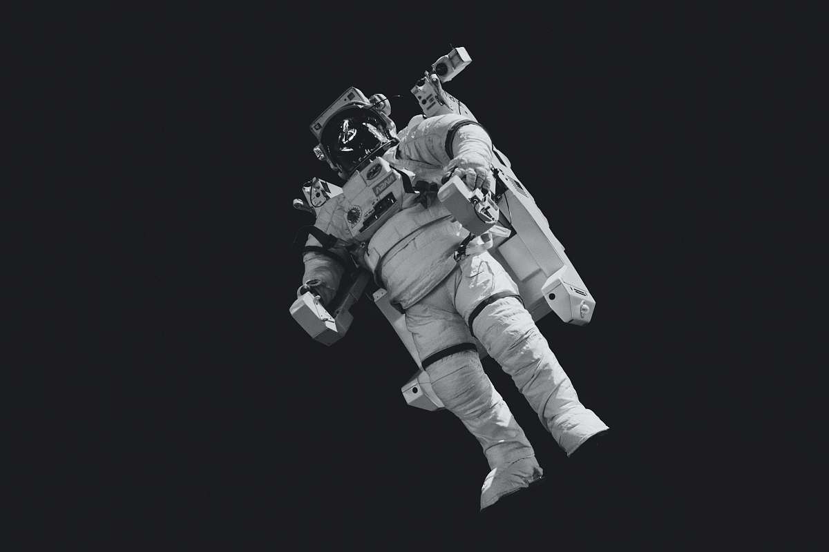 Person Astronaut In White Suit In Grayscale Photography Black-and-white ...