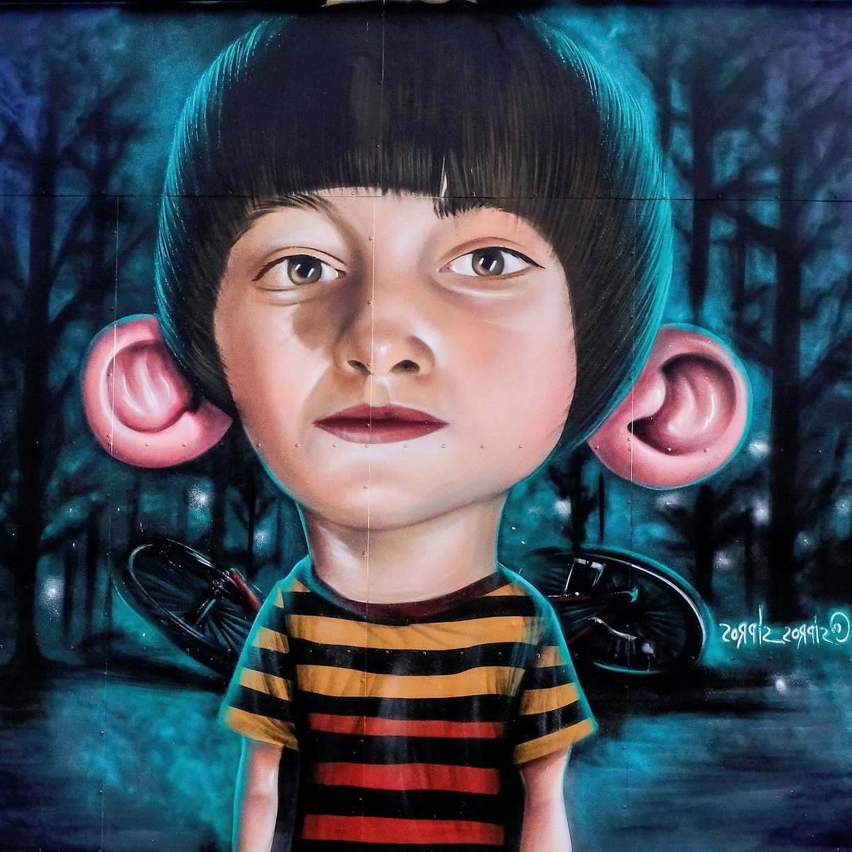 person boy with big ears painting people