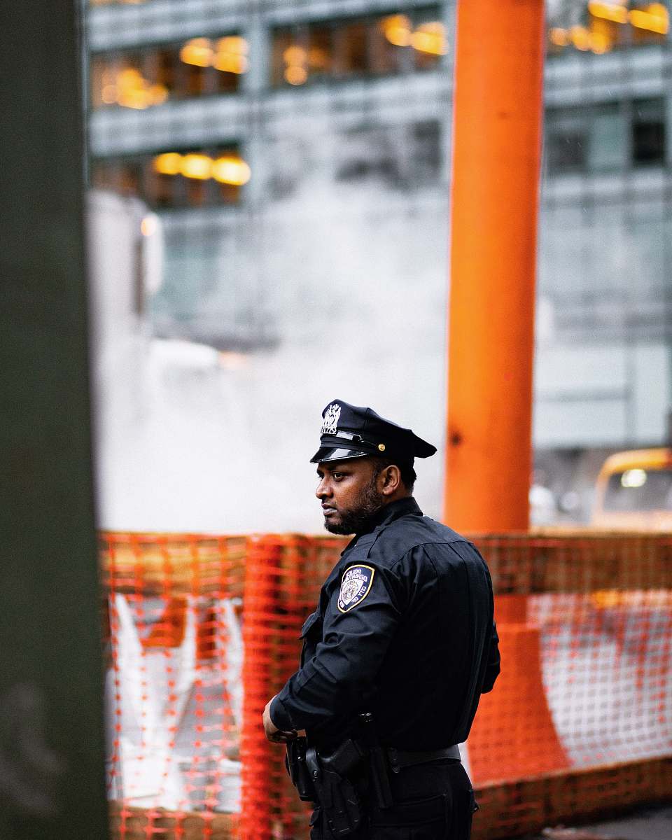 police chief standing near body of water officer