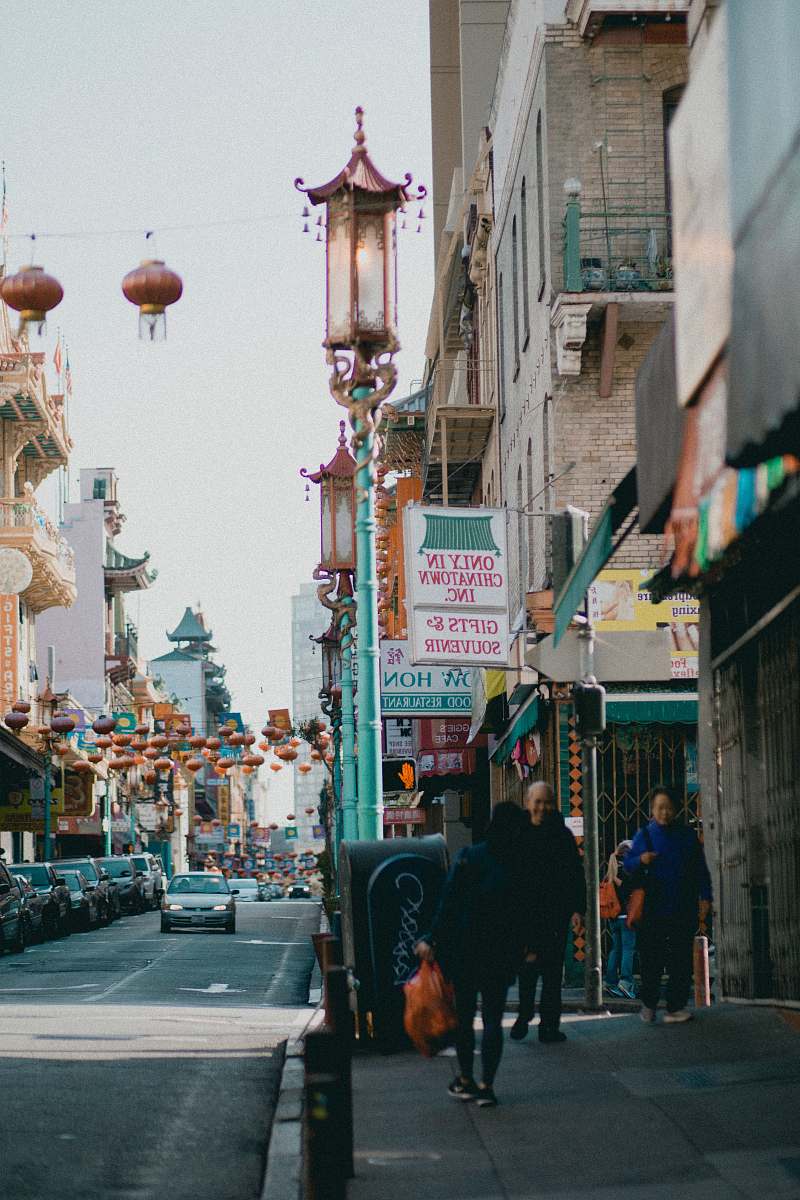 people crowd walking on pathway during daytime person