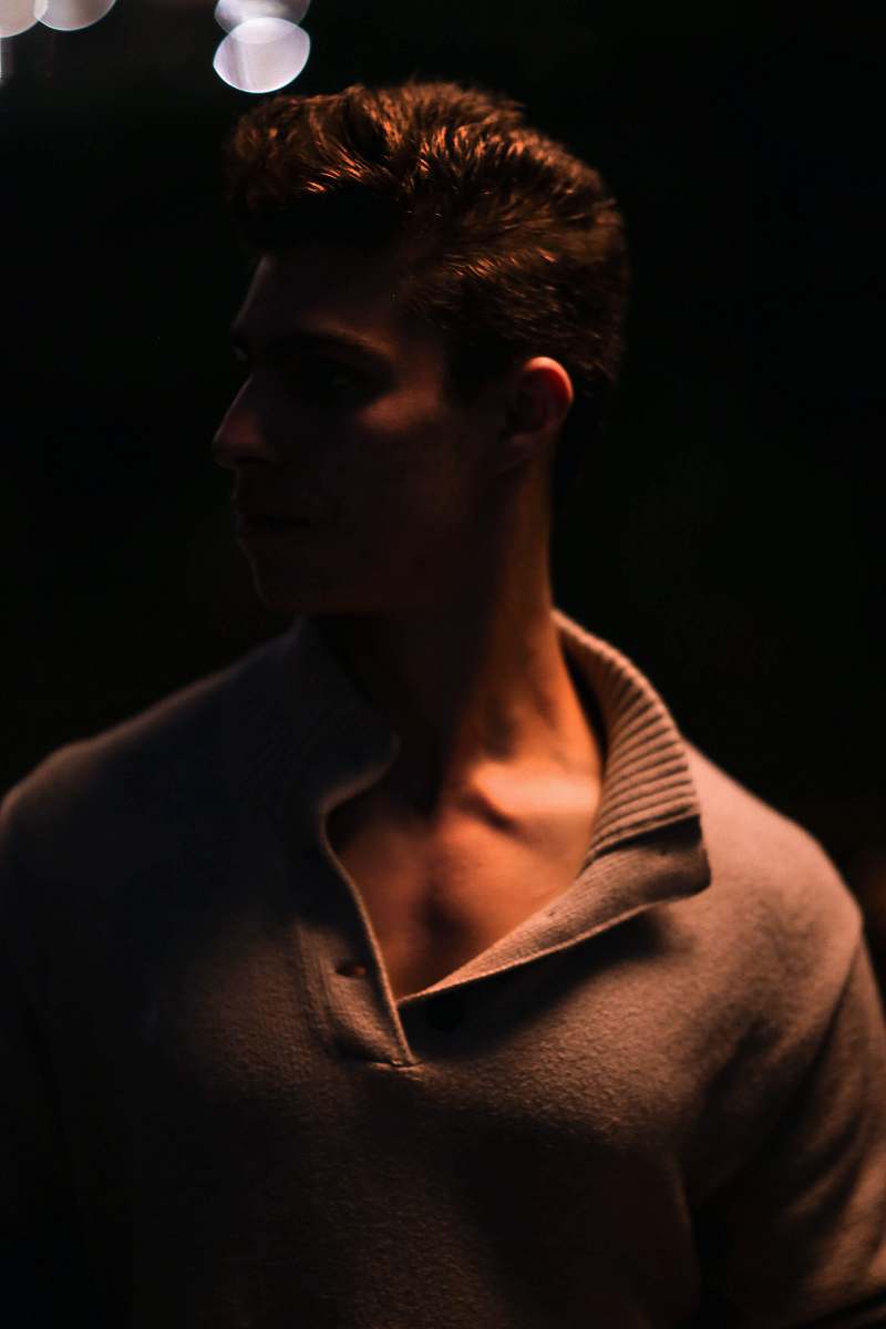 person man in brown polo shirt portrait photo people