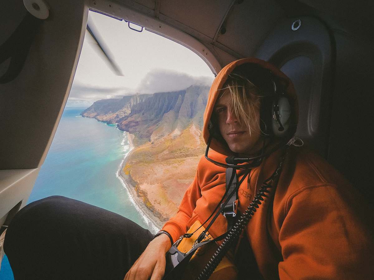 person man inside the plane during daytime people