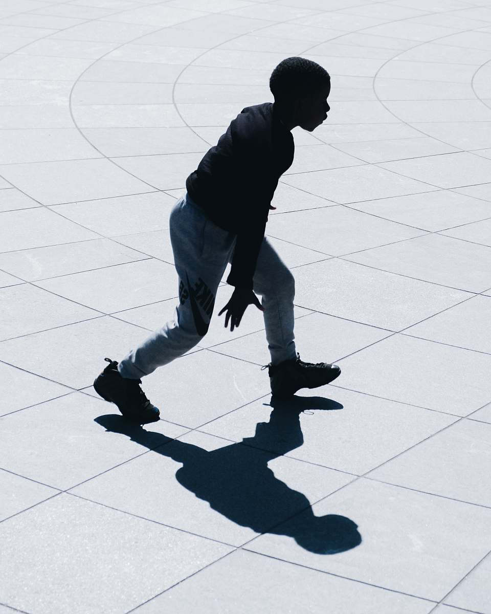 person man performing during daytime people