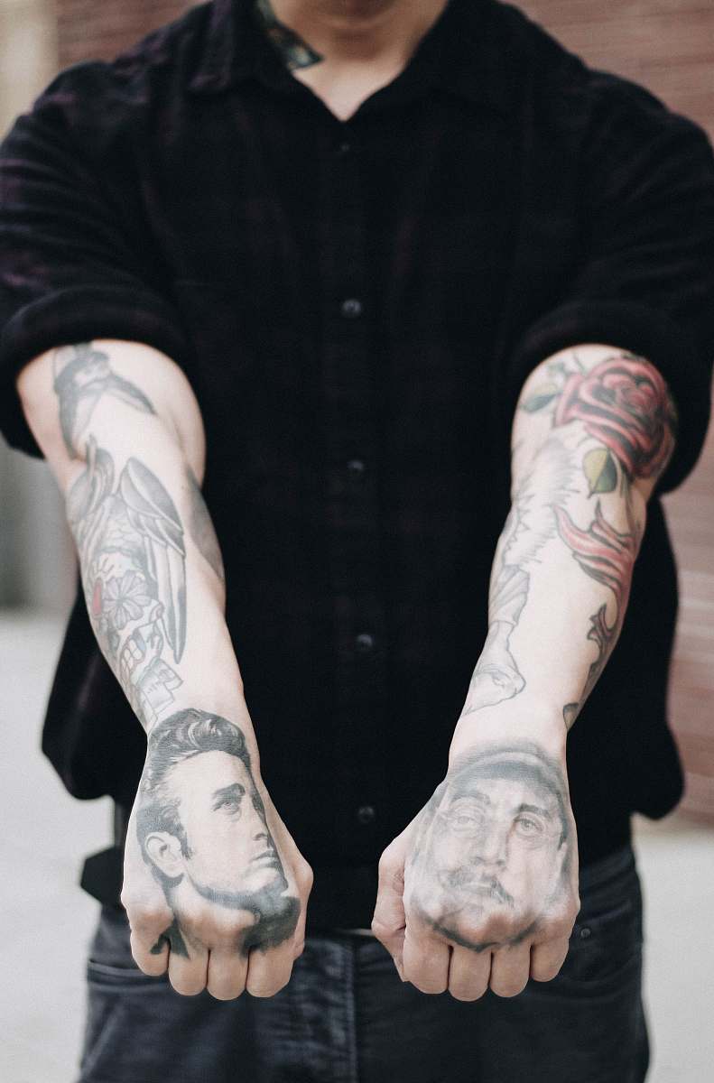 person man showing his tattoo people