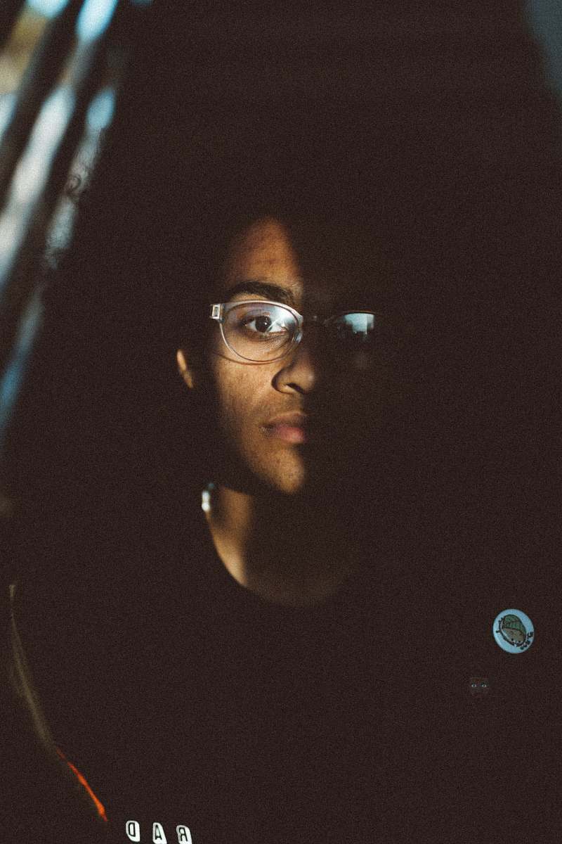 people man wearing eyeglasses during night person