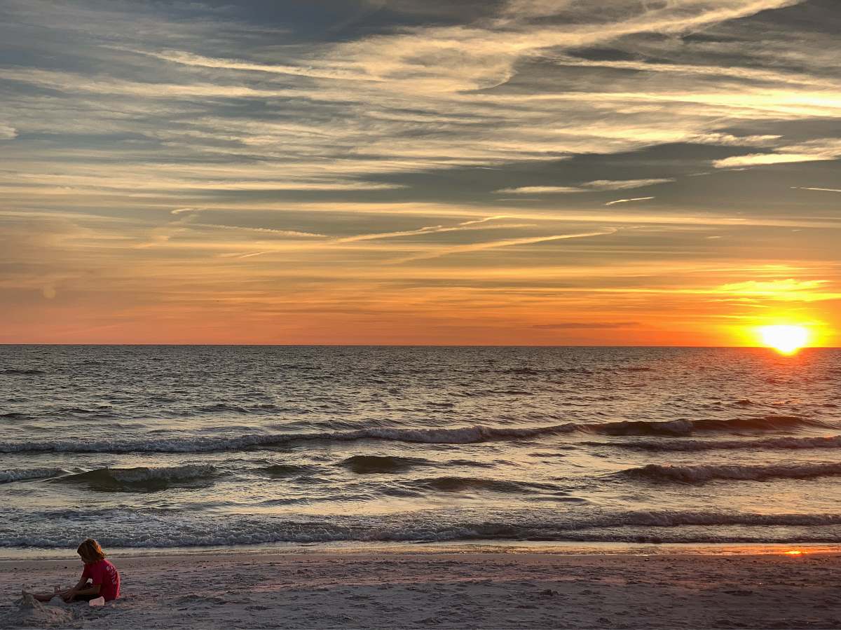 nature people sitting on seashore outdoors