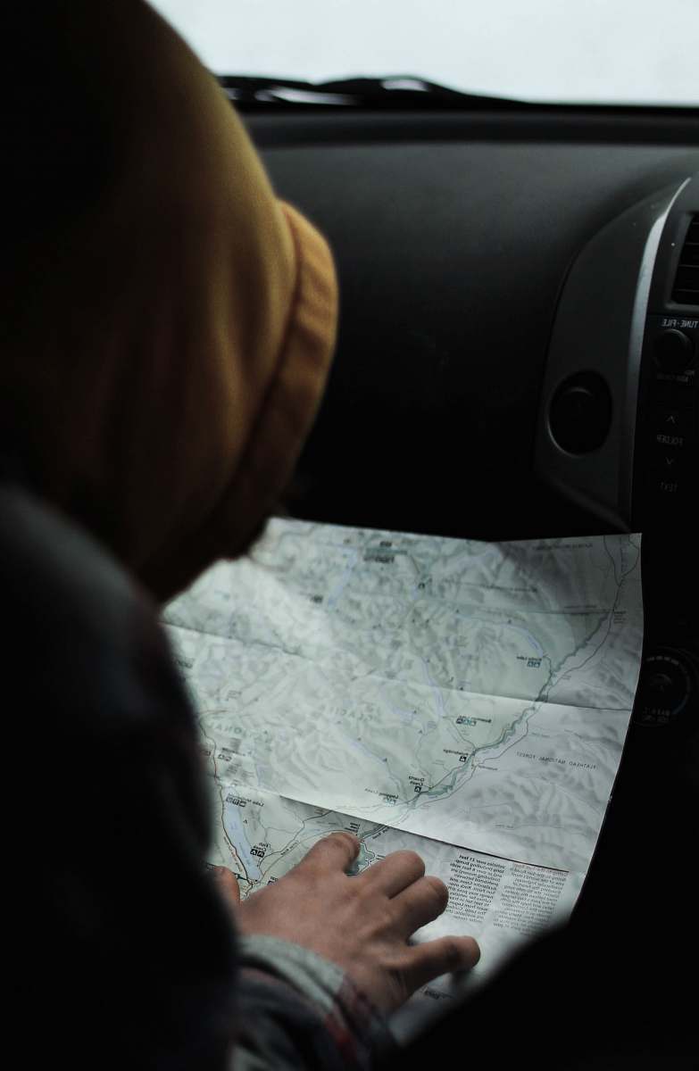 person person touching map poster people