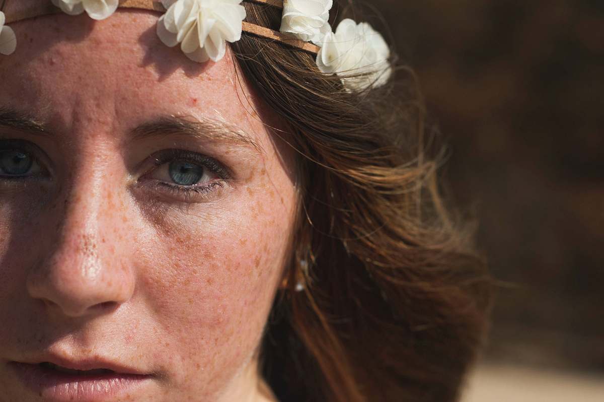 person portrait photo of woman wearing floral crown people