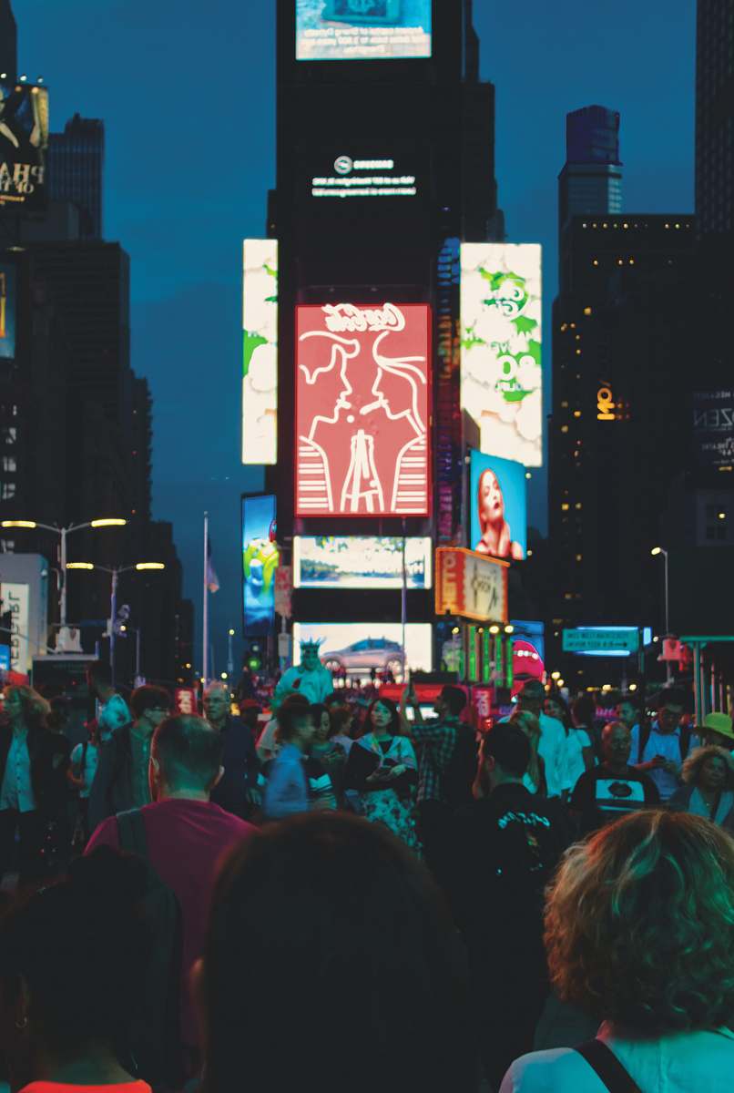 person red Coca Cola LED signboard people