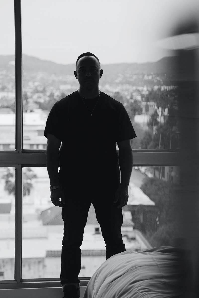 person silhouette of man wearing black crew-neck shirt black-and-white