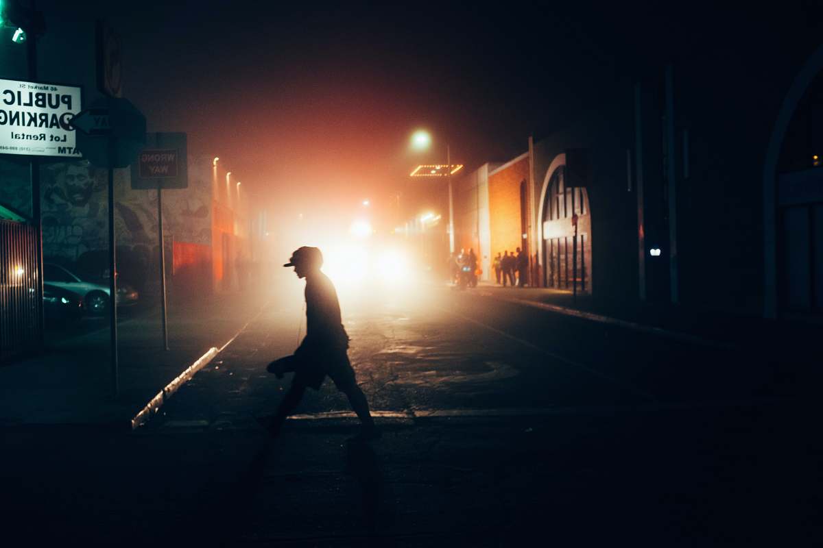 flare silhouette walking man light