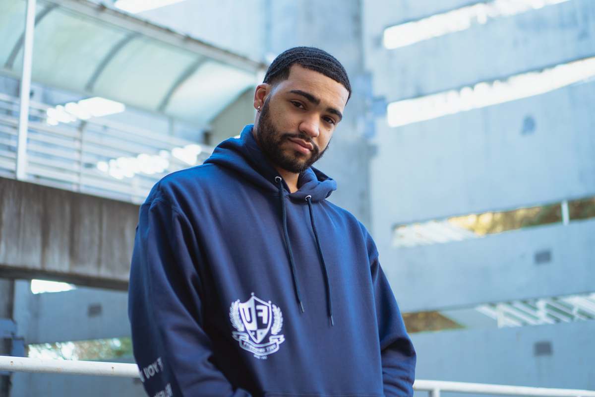 apparel unknown celebrity in blue pull-over hoodie clothing