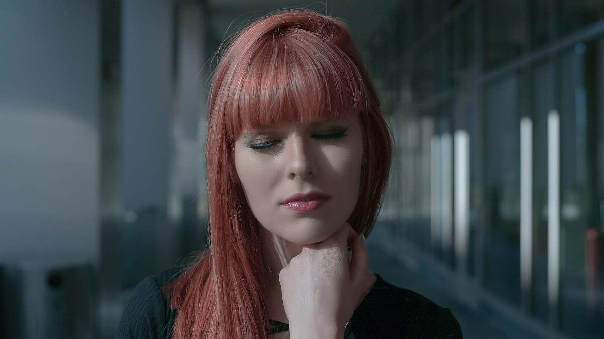 person velvet-haired woman closing her eyes people