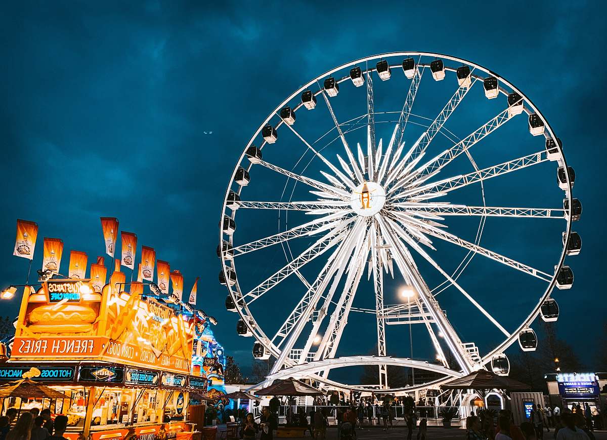 person white ferris wheel with lights amusement park