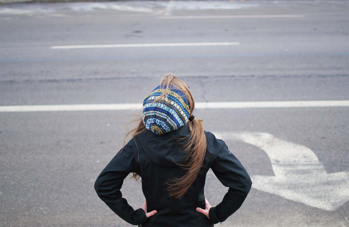 people woman standing near road person