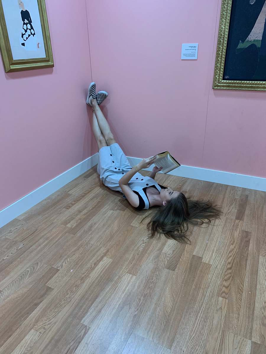 wood women lying in a brown floor in a room flooring