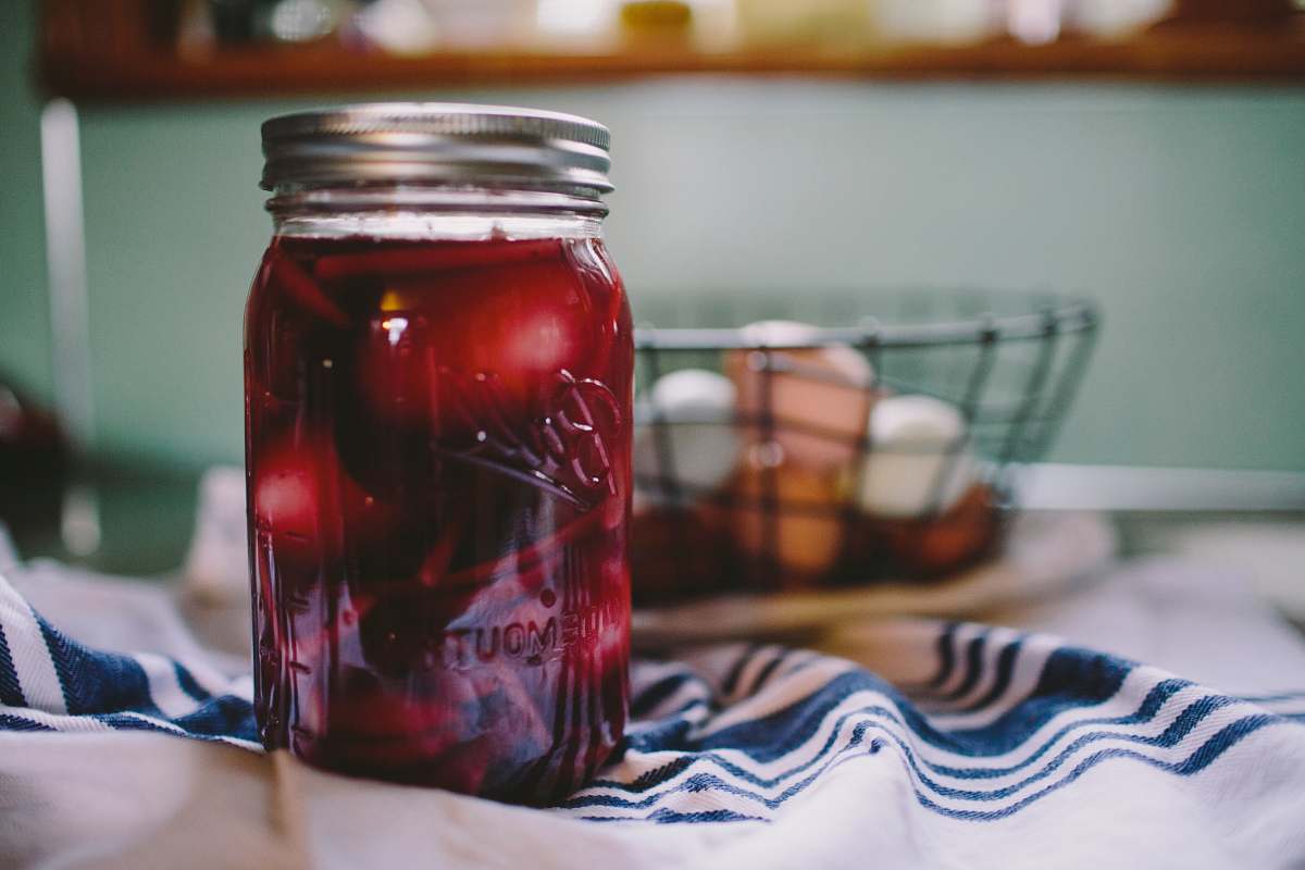jar clear glass filled mason jar with lid on white and blue textile food