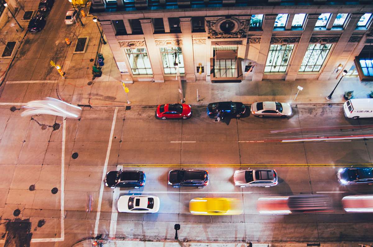 building bird's eye view of time laps of cars window