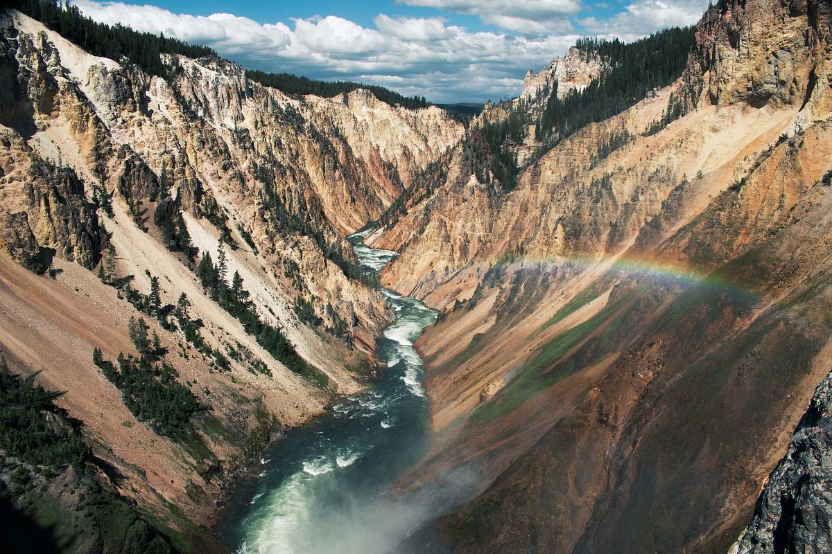 canyon aerial photo of mountain and river outdoors