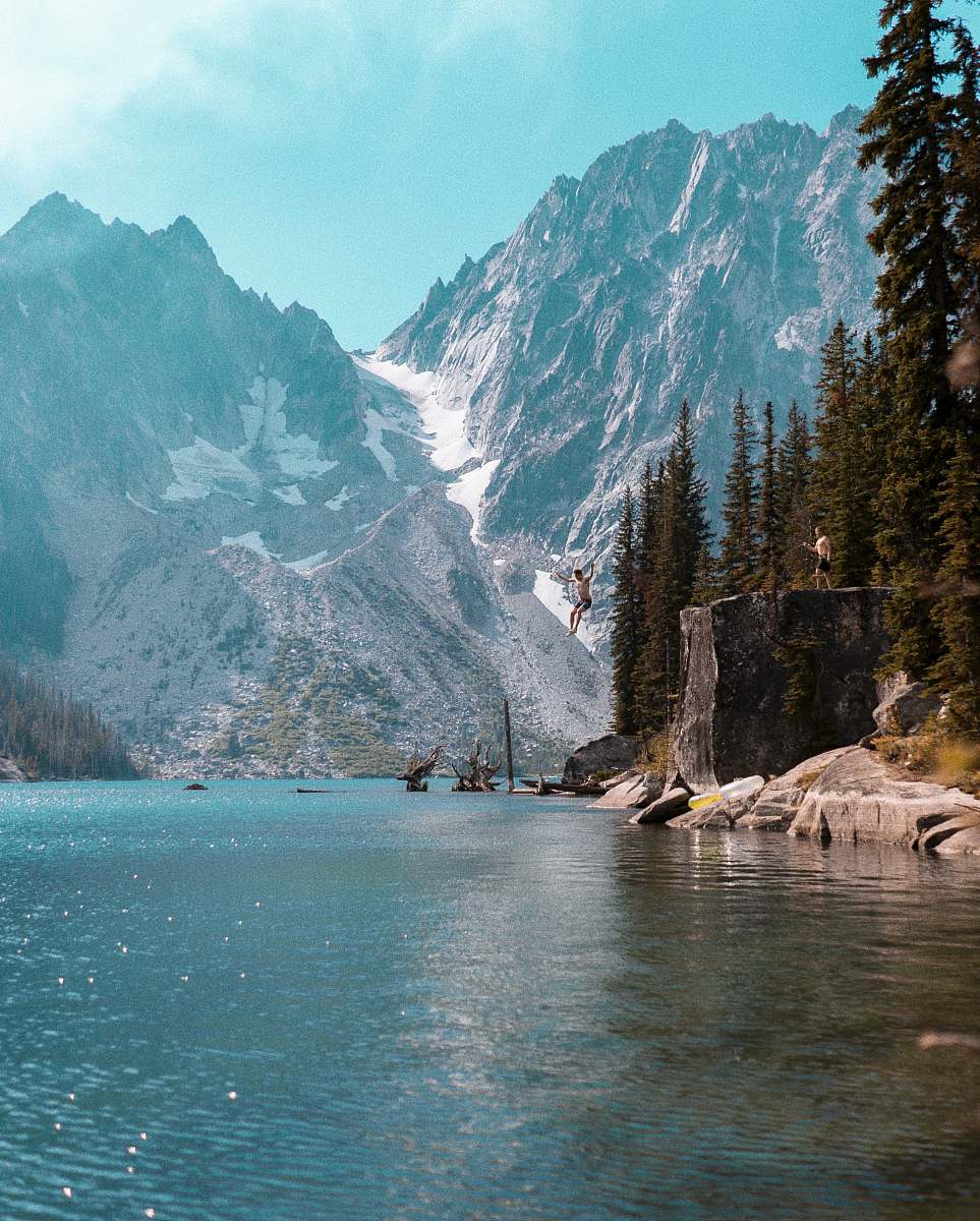 snow man jumped on a river glacier