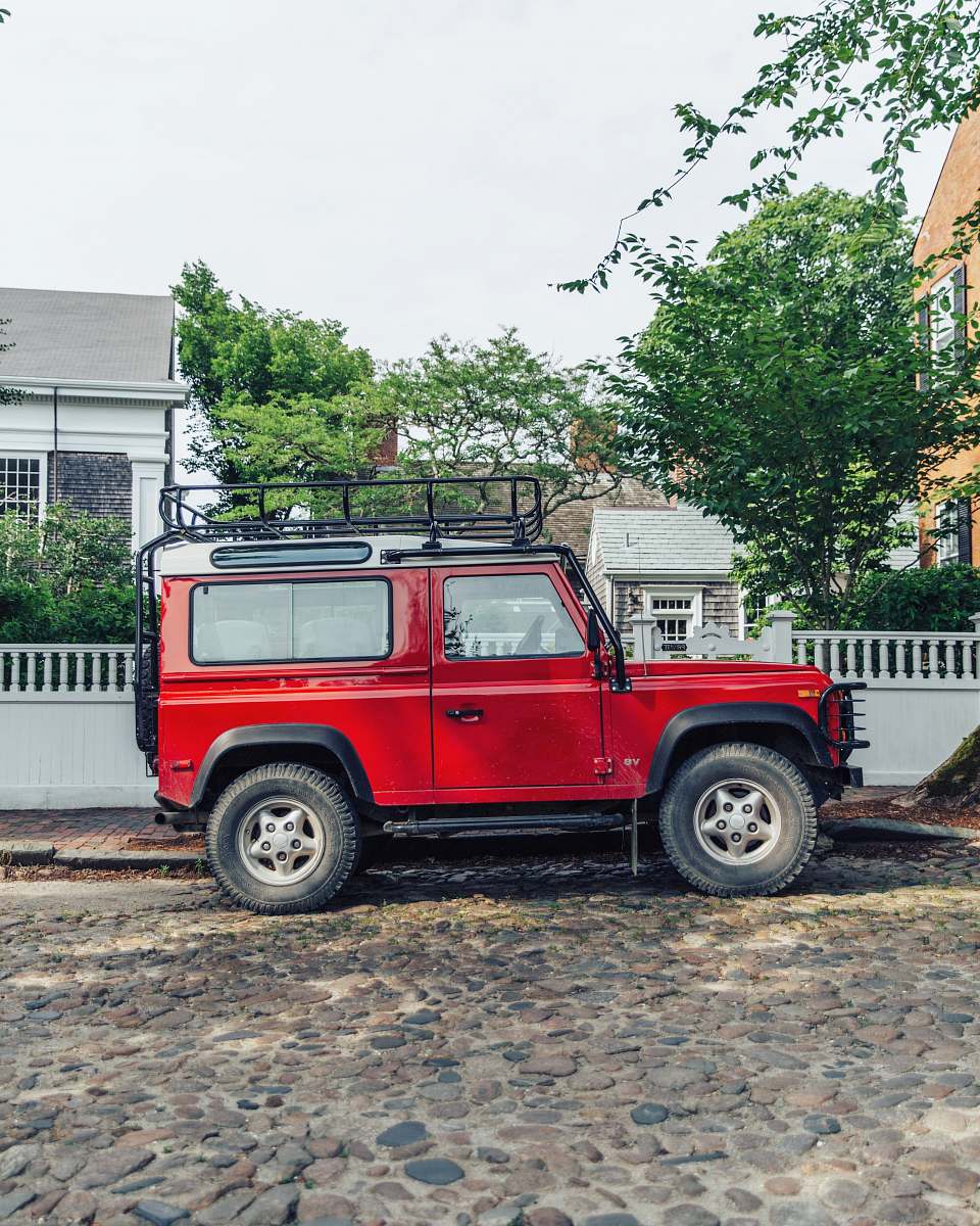 truck red off-road car parked at sidewalk 27 broad st
