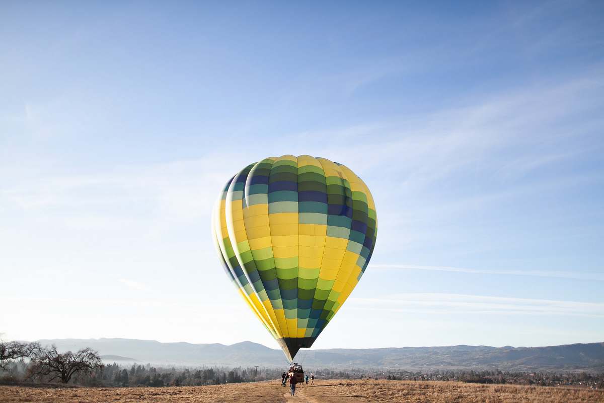 balloon yellow and blue hot air balloon at the ground hot air balloon