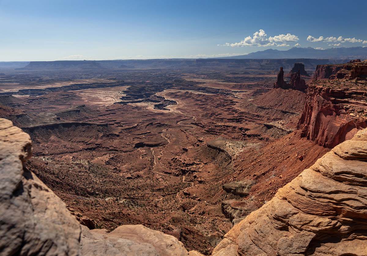 mountain aerial photography of brown mountain under clear blue sky canyon