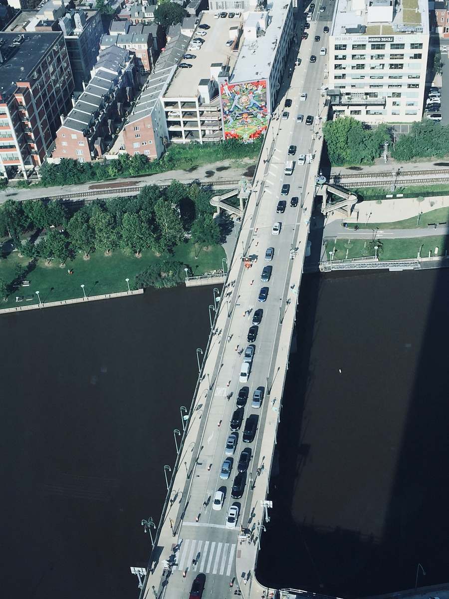 outdoors aerial photography of vehicles traveling on bridge during daytime landscape