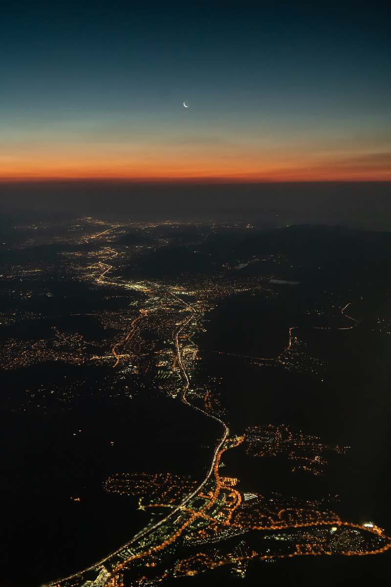 dawn aerial view photo of gray city dusk