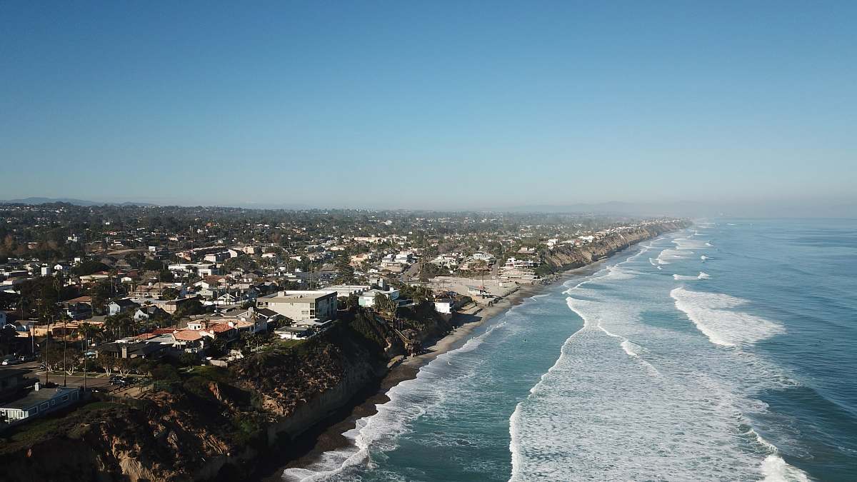 outdoors aerial view photography of village near beach landscape