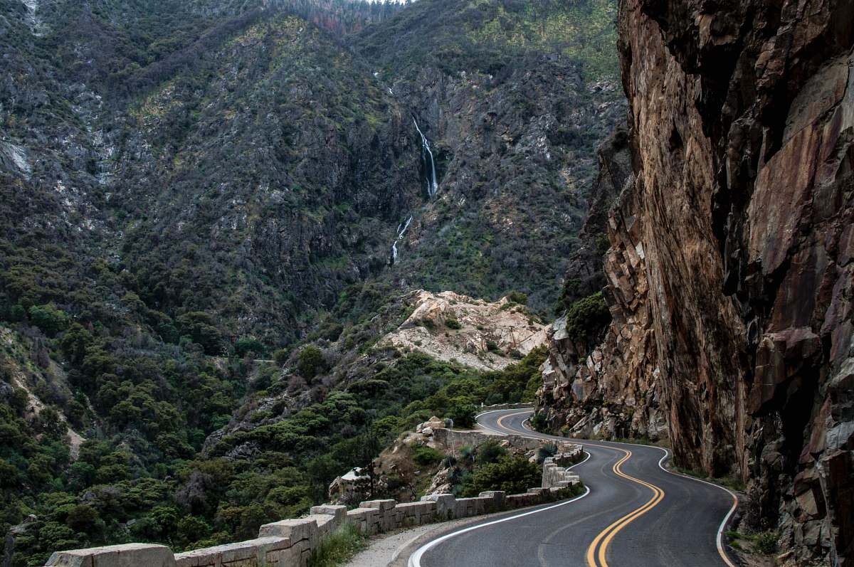road asphalt road beside cliff kings canyon national park
