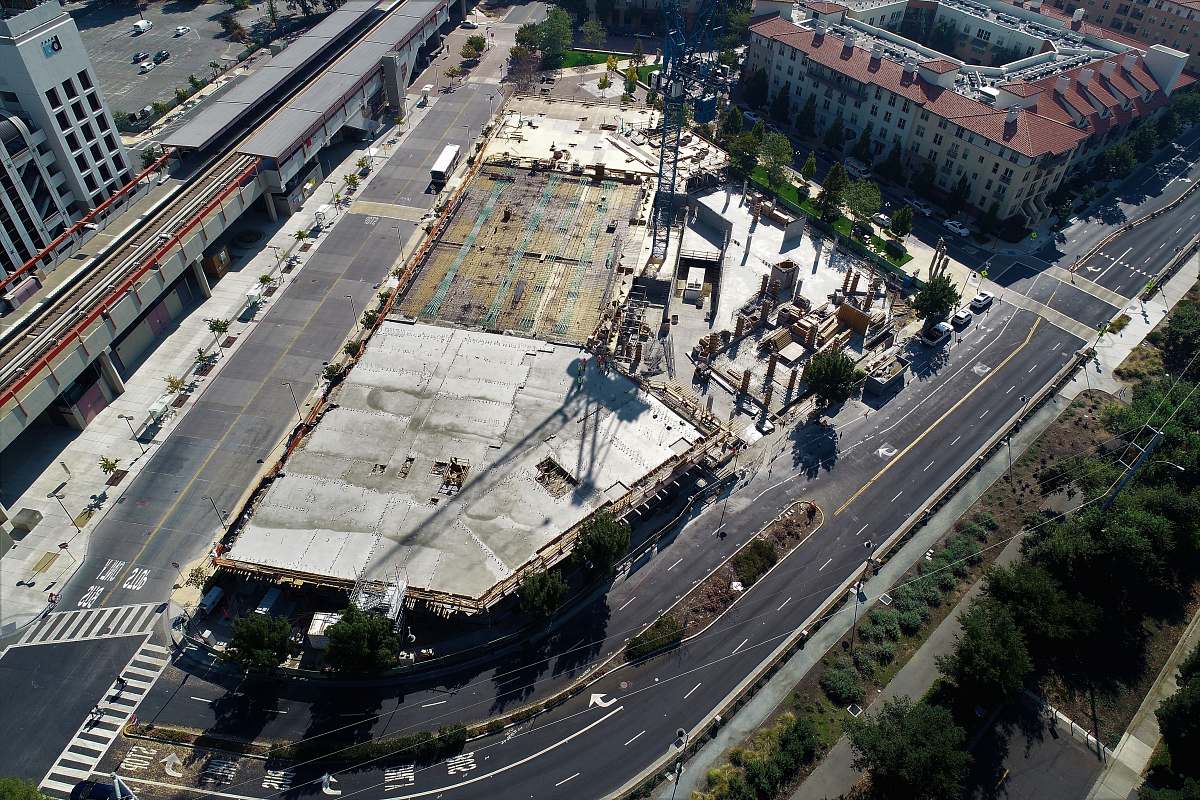 outdoors bird's-eye photography of road near buildings and trees landscape