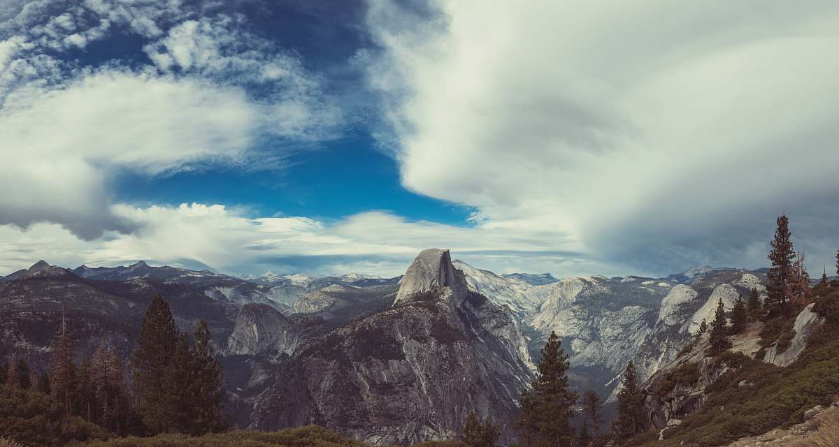 outdoors bird's eye view of mountain under white and blue sky mountain