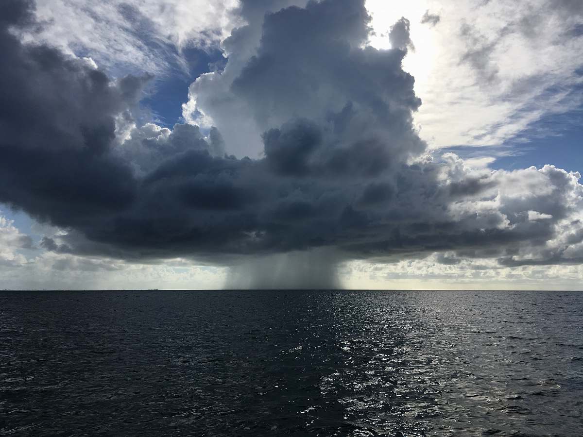 outdoors body of water under the cloudy sky during daytime cloud