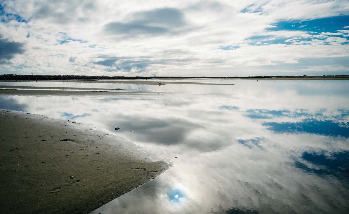 grey body of water under white clouds during daytime provincetown causeway