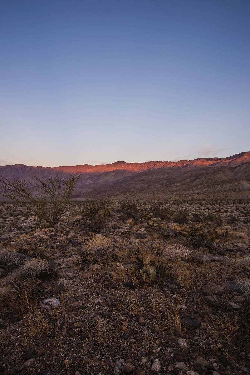 outdoors brown mountain under blue sky during daytime ground