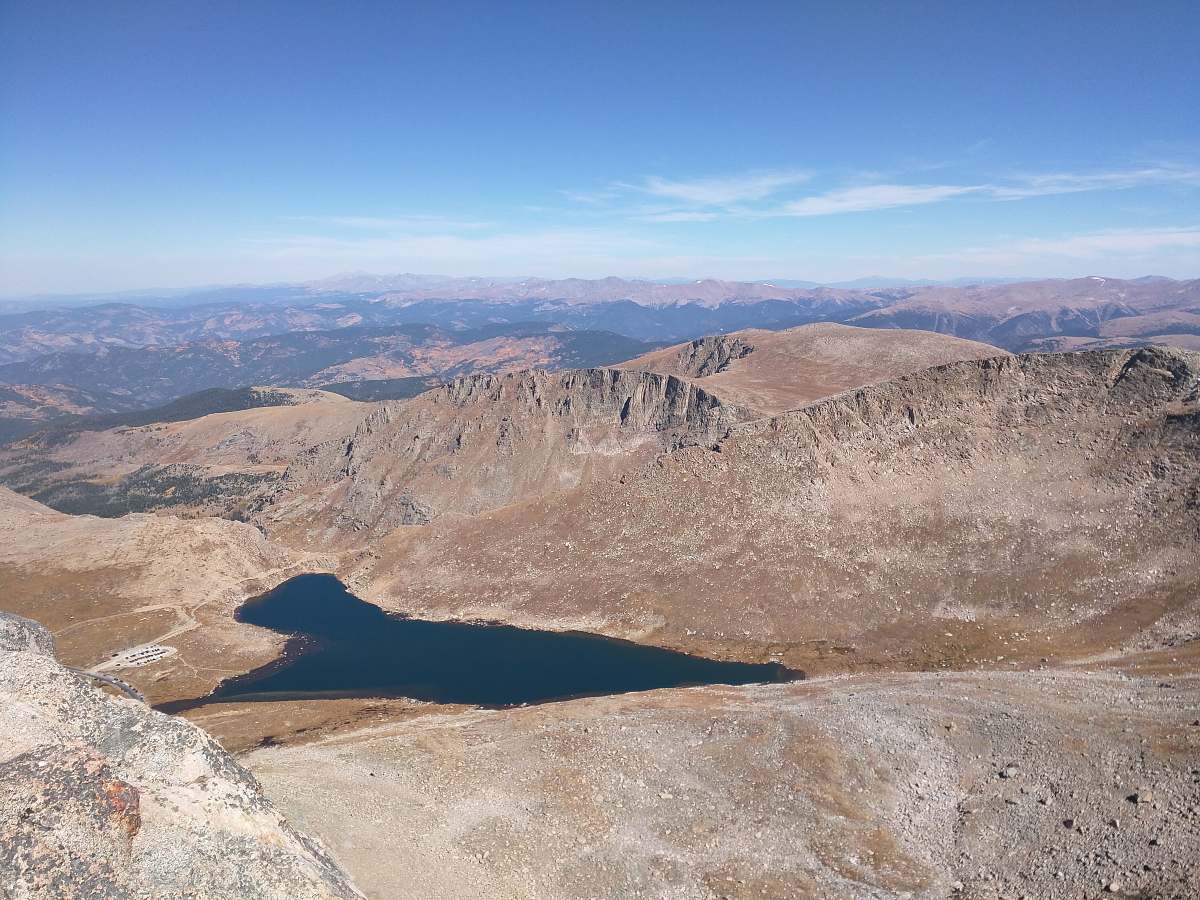 outdoors brown mountain under blue sky mountain