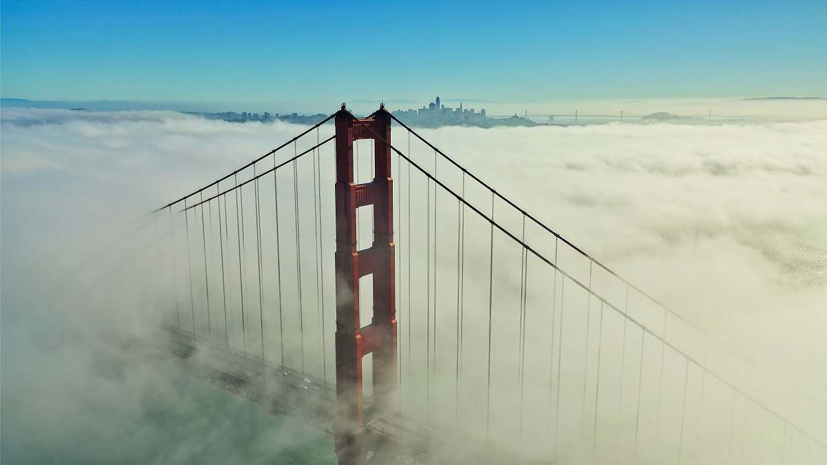 fog Golden Gate bridge covered in clouds golden gate bridge