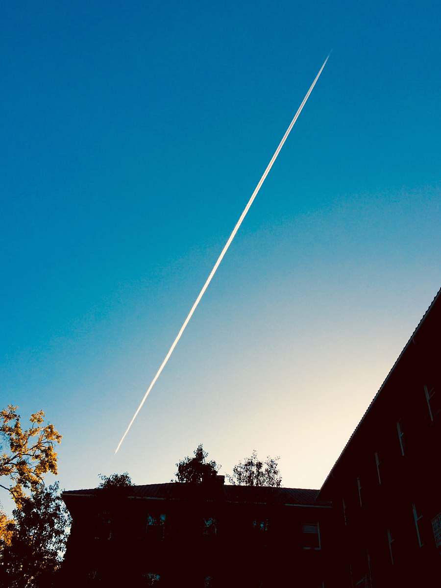 outdoors jet plane under blue sky flare