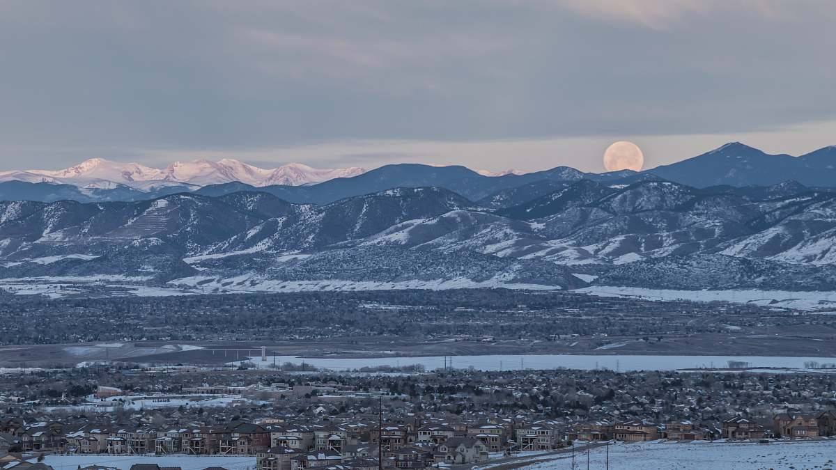 outdoors landscape photo of snow covered mountains under cloudy sky mountain