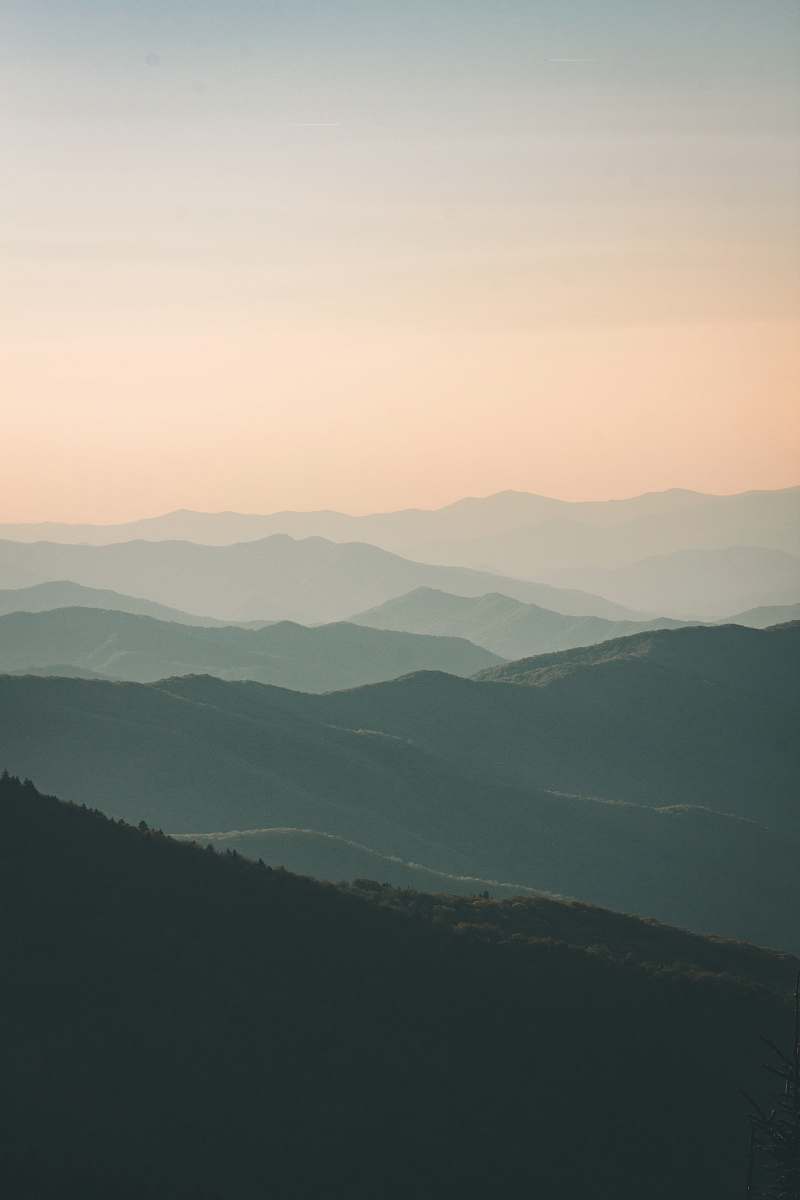 mountain mountains under white mist at daytime landscape