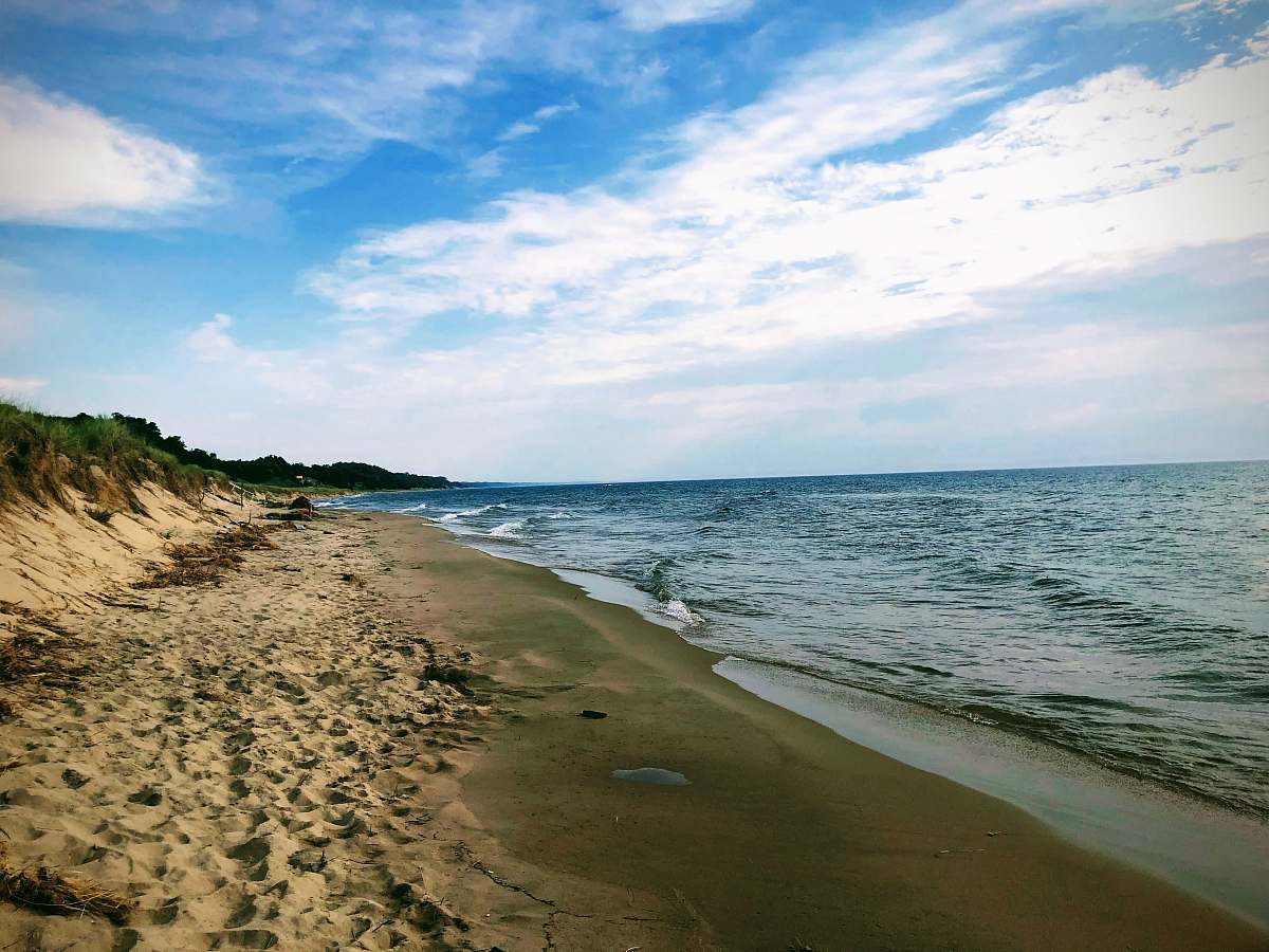 water sea waves during daytime shoreline